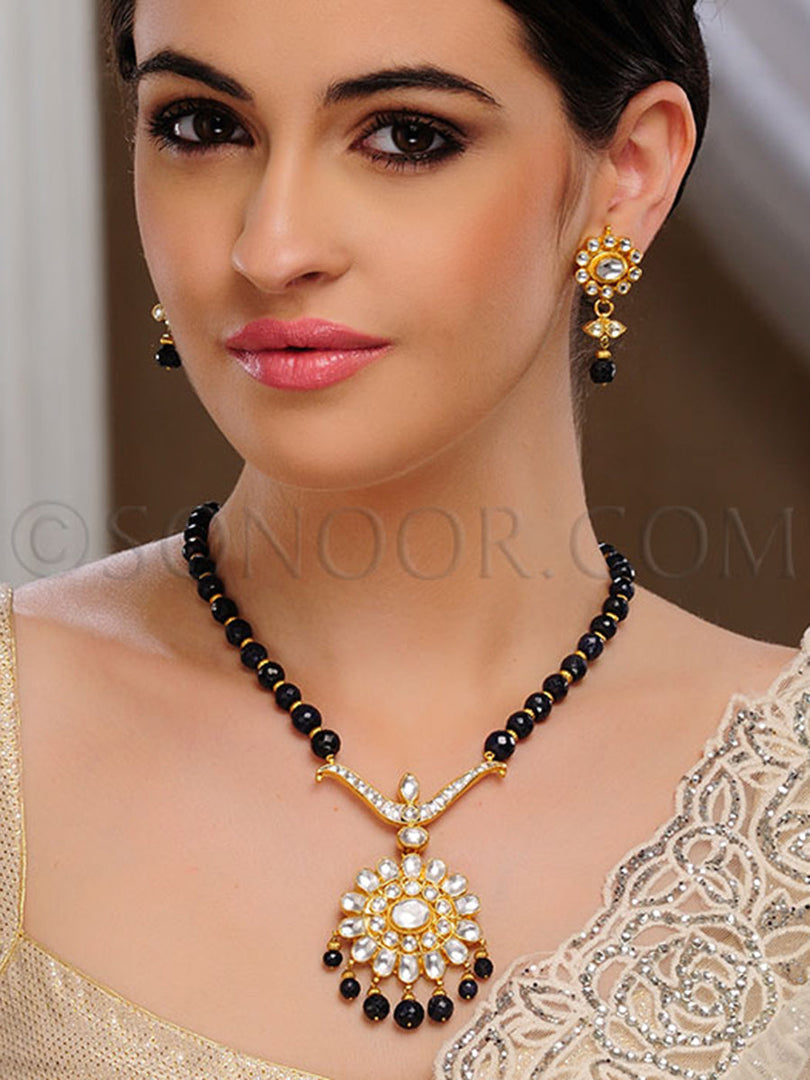 Nisita Kundan Blue Beads String Pendant Set