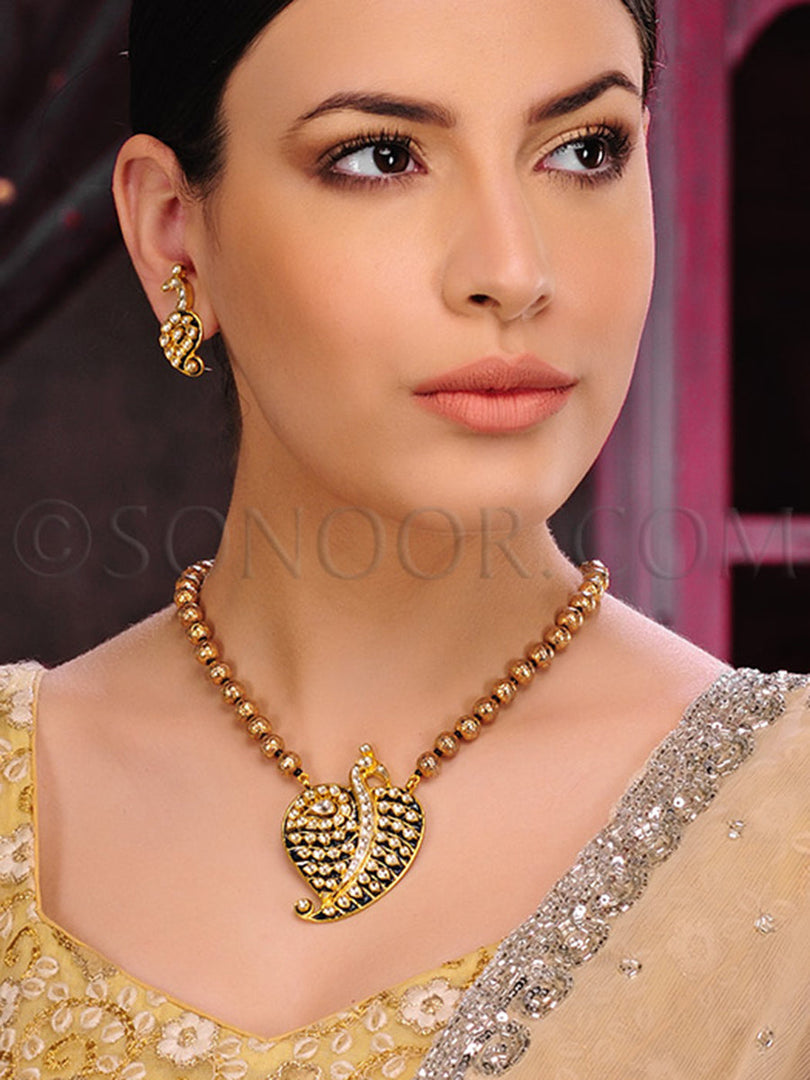 Advika Kundan Meena Kari Pendant Set