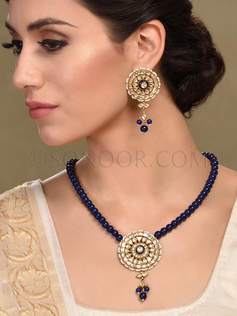 Nirvi Kundan Stone Blue beads String Pendant Set